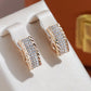 Boucles d'oreilles pavés de zircons, bijou en plaqué or rose et en zircons naturels