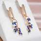 Boucles d'oreilles Fleurs bleues, bijou en plaqué or rose et en zircons naturels