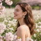Boucles d'oreilles Marguerite, bijou en acier inoxydable et en émail