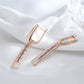 Boucles d'oreilles pendantes zircons mauves, bijou en plaqué or rose et en zircons naturels