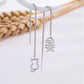 boucles d'oreilles pendantes chat et poisson