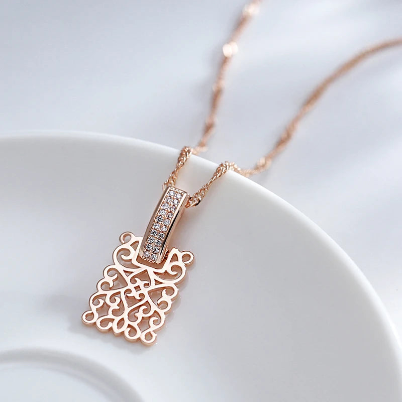 Collier avec motif d'arabesques et zircons, bijou en plaqué or rose 585 (14 carats) et en zircons naturels