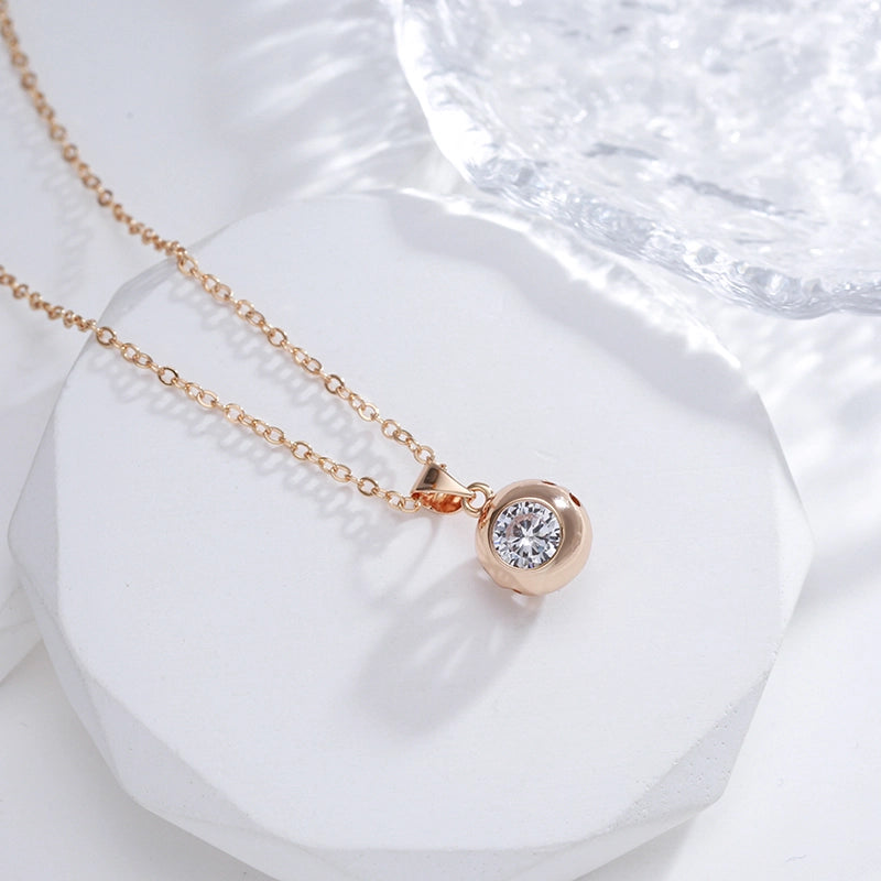 Collier boule zircon blanc, bijou en plaqué or rose et en zircon naturel