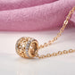 Collier pendentif exotique et ajouré, bijou en plaqué or rose et en zircons naturels
